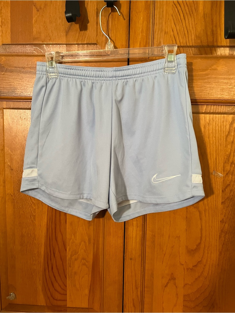 Nike Light Blue Women's Athletic Shorts with White Swoosh